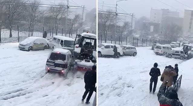 The three cars slide down the icy road. Source: Jukin