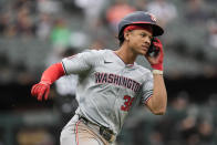 Washington Nationals' Trey Lipscomb runs the bases after hitting a single, allowing Nick Senzel to score, during the eighth inning in the first baseball game of a doubleheader against the Chicago White Sox, Tuesday, May 14, 2024, in Chicago. (AP Photo/Erin Hooley)