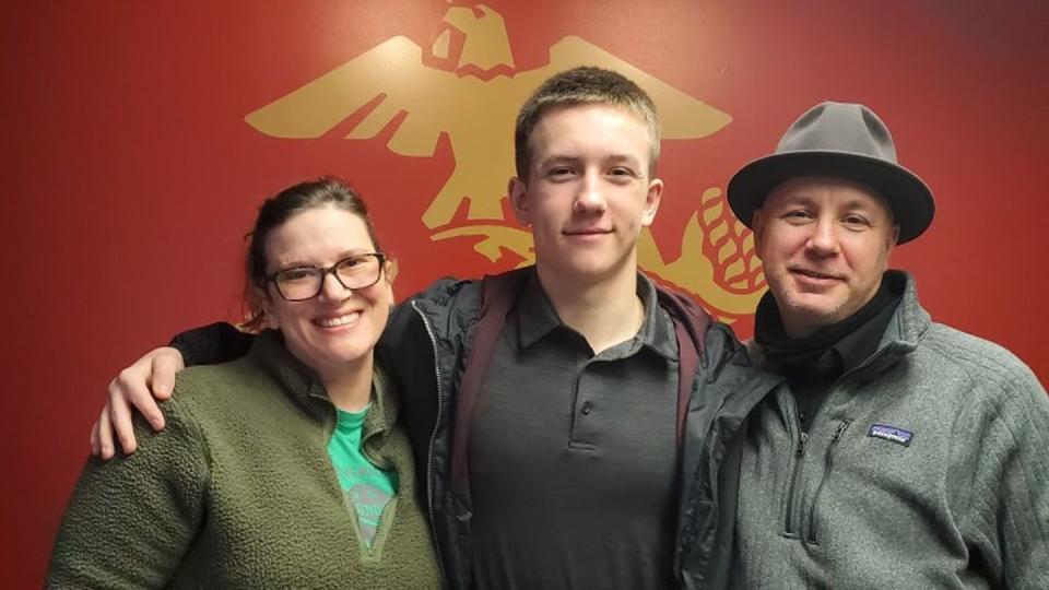 Pfc. Zachary Riffle, center, with his stepmom, Jen, and father, Robert. Riffle was killed January 2022 in a 7-ton truck rolllover. (Jen Riffle)
