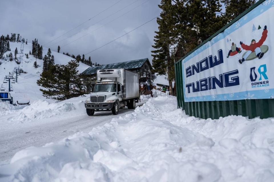 A Stohlgren Bros. truck makes a stop at Donner Ski Ranch earlier this month. Driver Holder said he has been busy making deliveries despite the heavy snow that fell in the area. Hector Amezcua/hamezcua@sacbee.com