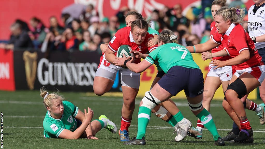 Lleucu George of Wales takes on Edel McMahon of Ireland