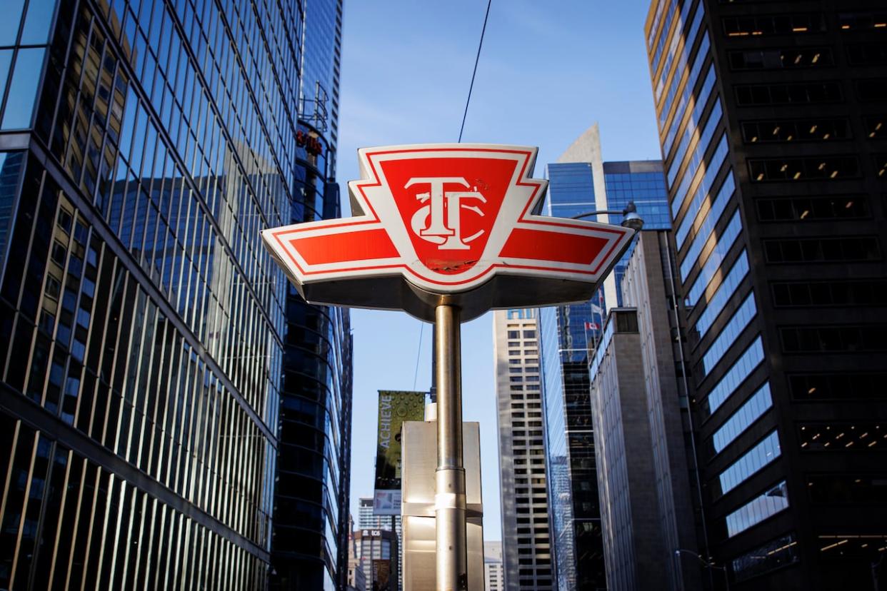 Toronto Transit Commission signage is pictured on Jan. 26, 2023. The TTC board has approved an operating budget for 2024 that freezes fares at 2023 rates, the board said in a news release on Wednesday. (Evan Mitsui/CBC - image credit)
