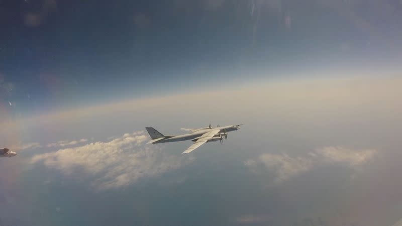 Russian Tu-95 strategic bomber flies during military exercises at an unidentified location