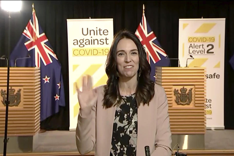 In this image made from video, New Zealand Prime Minister Jacinda Ardern waves to continue to speak when shaking stopped after an earthquake during a live television interview in Wellington, New Zealand, Monday morning, May 25, 2020. The quake struck in the ocean about 100 kilometers (62 miles) northeast of Wellington, according to the U.S. Geological Survey. New Zealand sits on the Pacific Ring of Fire and is sometimes called the Shaky Isles for its frequent quakes. (Newshub via AP)