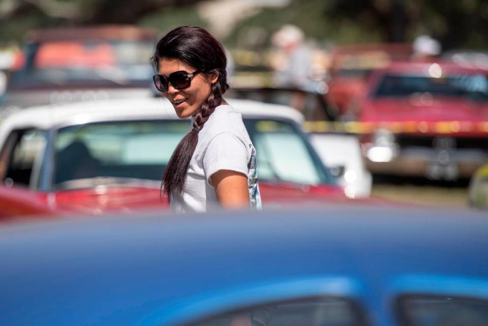 Spectators look at classic cars at Cruisin’ Central at Centennial Plaza during Cruisin’ the Coast on Tuesday, Oct. 3, 2023.