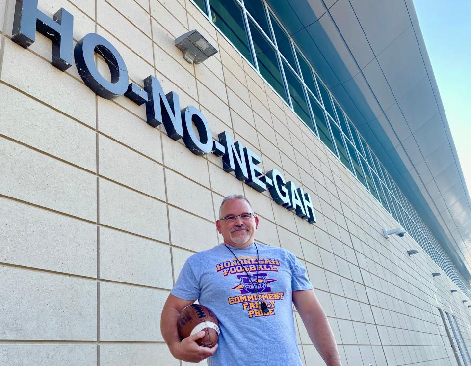Hononegah football coach Brian Zimmerman stands outside the school's fieldhouse before practice on June 21, 2023.