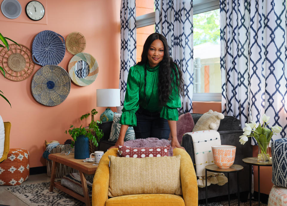 Beauvais poses in the teacher's lounge she helped design. (HomeGoods)