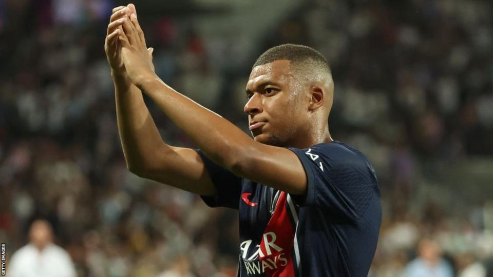 Kylian Mbappe applauds the crowd following PSG's 1-1 draw with Toulouse last week.