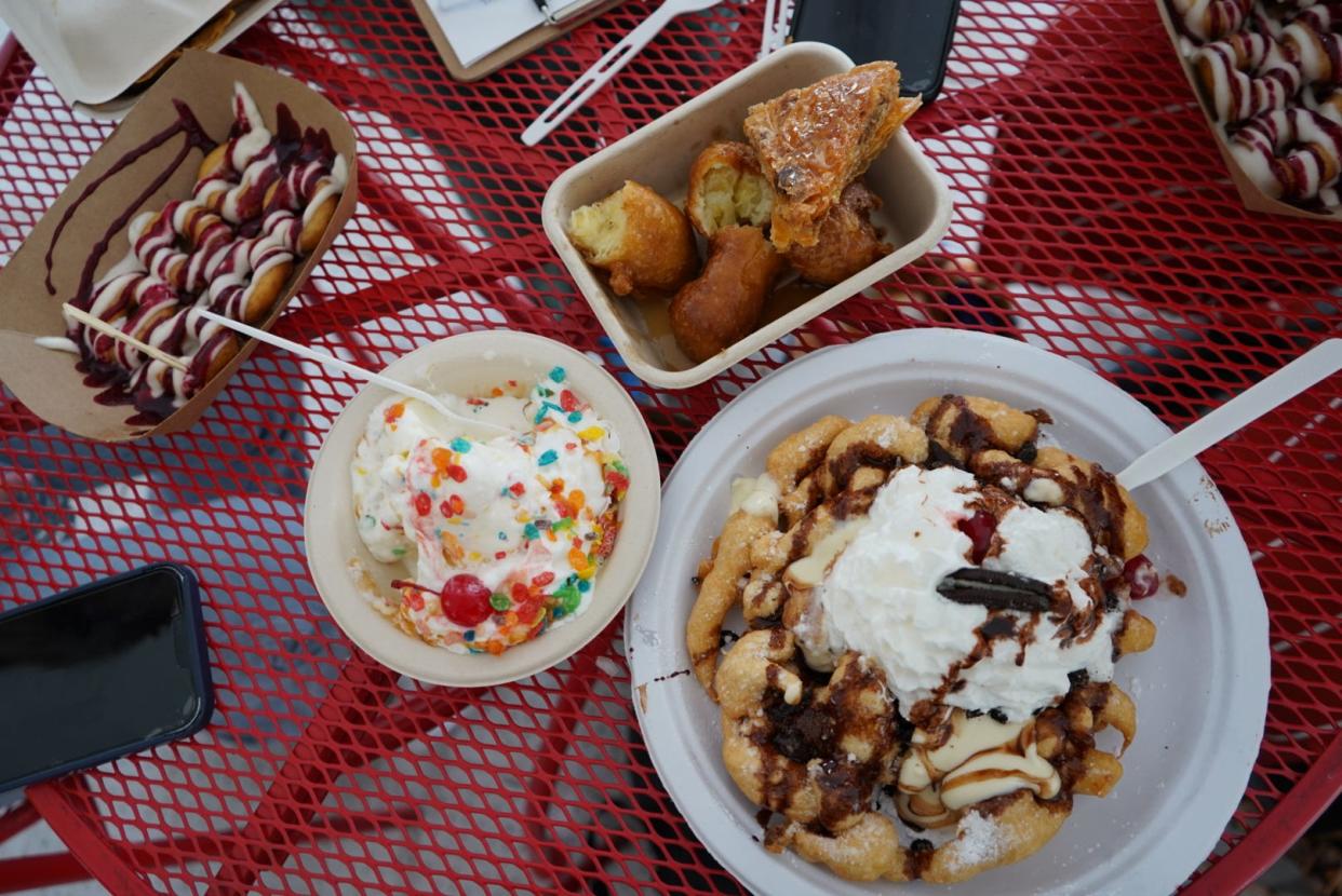 Clockwise from top: Tempura fried bananas from Lucky Lucky Dumpling Co., Oreos Cookies and Cream funnel cake from LT's Gold Dome Funnel Cakes and a Caramel on the Rocks sundae from Guiltless Concessions at the 58th annual Festival of the Arts in downtown OKC’s Bicentennial Park.