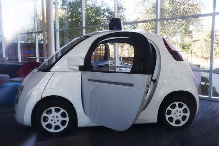 File Photo: A Google self-driving car is seen inside a lobby at the Google headquarters in Mountain View, California November 13, 2015. REUTERS/Stephen Lam