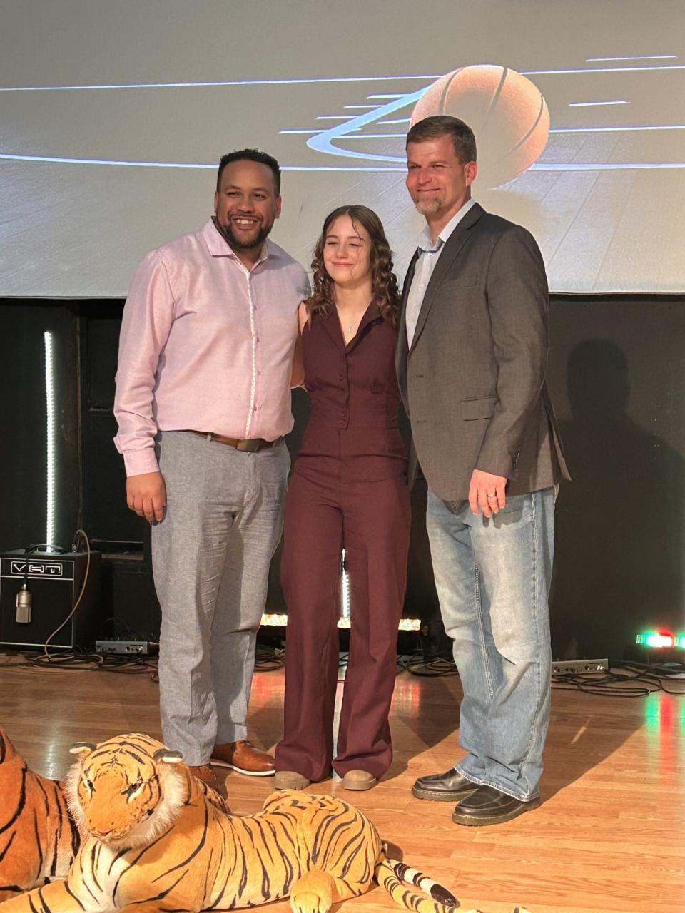 From left to right: Alamogordo High School Assistant Head coach James Bowman, Savannah Veith, Alamogordo High School Head Coach Jeremy Knee