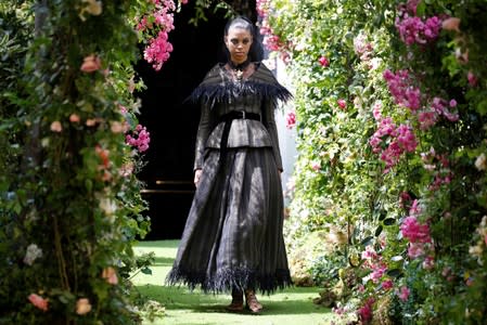 A model presents a creation by designer Maria Grazia Chiuri as part of her Haute Couture Fall/Winter 2019/20 collection show for fashion house Dior in Paris