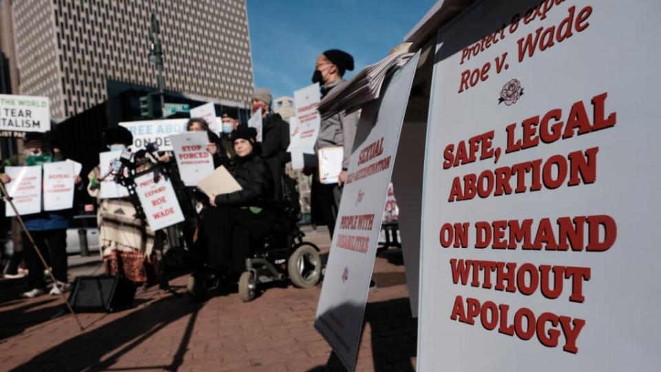 A small group of pro-choice protesters gather outside a courthouse on December 1, 2021 in New York City. The U.S. Supreme Court heard arguments in Dobbs v. Jackson Women’s Health, a case about a Mississippi law that bans most abortions after 15 weeks. (Photo by Spencer Platt/Getty Images)
