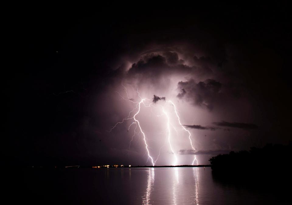 Bolts of lightning strike near the Sanibel Causeway on Friday 8/10/2018. Photographed using a Canon 1DX with a 1250 ISO at 30 sec at f/10. Shot from a safe distance with a wide angle lens.  