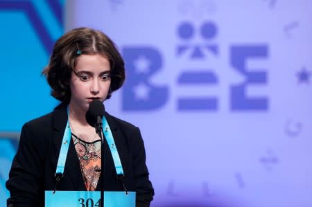 Colette Giezentanner competes in the final round of the 92nd annual Scripps National Spelling Bee in Oxon Hill, Maryland.
