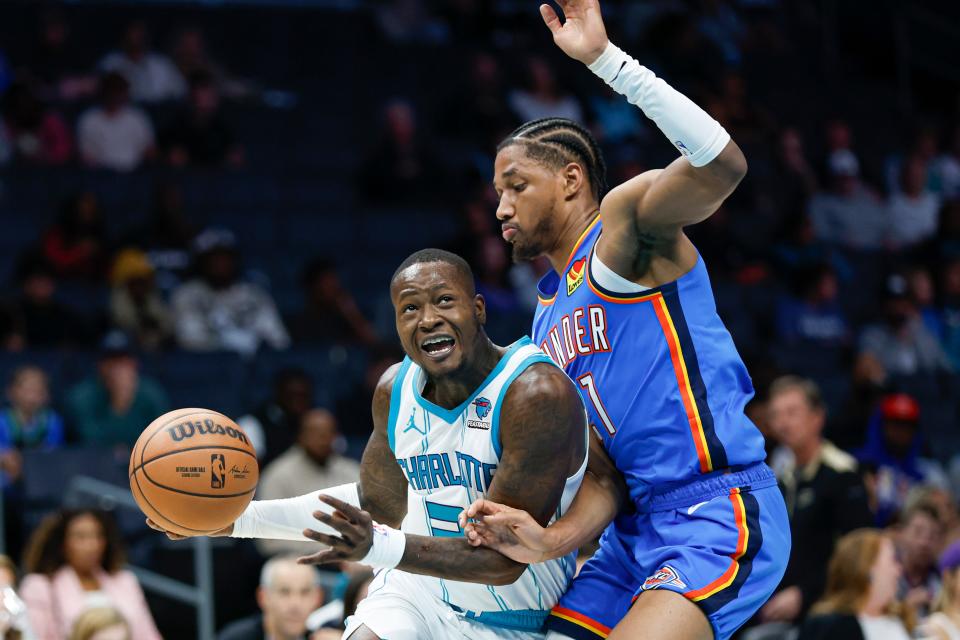 Oct 15, 2023; Charlotte, North Carolina, USA; Charlotte Hornets guard Terry Rozier (3) drives to the basket against Oklahoma City Thunder guard Aaron Wiggins (21) in the second half at Spectrum Center. Mandatory Credit: Nell Redmond-USA TODAY Sports
