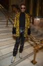 <p>The Halpern fashion show during London Fashion Week proved the perfect opportunity for Porter to wear a gold and black embellished blazer with black leather trousers and silver, glittery boots. </p>