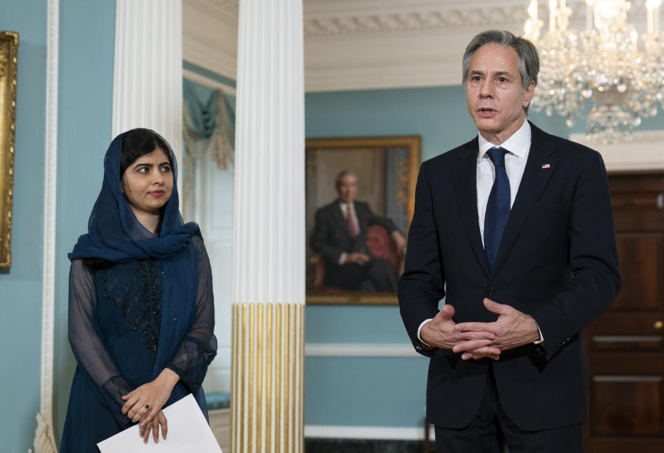 Secretary of State Antony Blinken welcomes Malala Yousafzai, Pakistani activist for female education and a Nobel Peace Prize laureate, at the State Department, Monday, Dec. 6, 2021, in Washington. (AP Photo/Manuel Balce Ceneta, Pool)