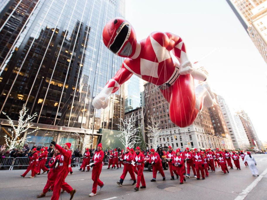 A red power ranger balloon at the macy's thanksgiving day parade