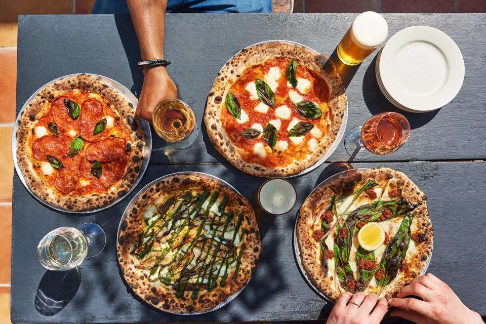 Overhead view of 4 pizzas at Santa Panza