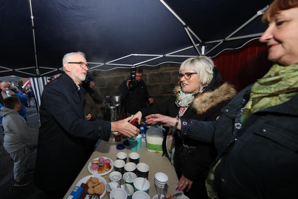 Labour Party leader Jeremy Corbyn stops to speak to ladies manning a refreshments stall following flooding in Bentley, Doncaster, South Yorkshire, during General Election campaigning.