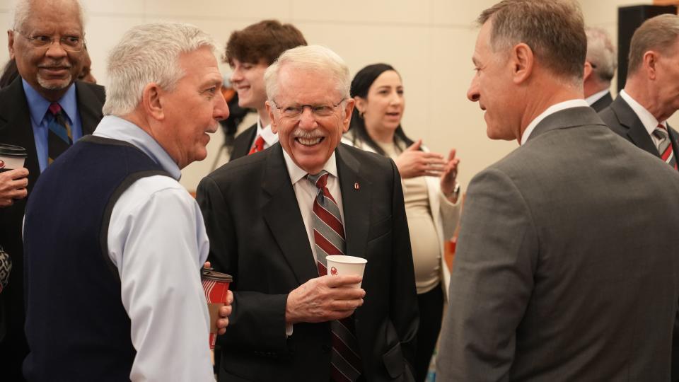 Michael Curtin (left), John Zeiger and Jamie Corral talk Monday, Feb. 19, 2024, before an Ohio State University Wexner Medical Center event announcing a $50 million gift that will help fund the health system’s new hospital tower project, set to open in 2026. Curtin represented the Wolfe family at the event; Zeiger is an Ohio State Board of Trustees member; Corral is director of nursing, critical care at the hospital.