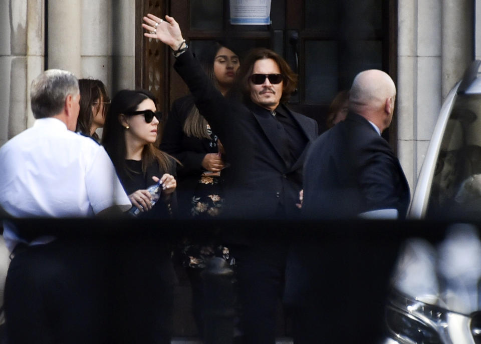 Actor Johnny Depp leaves the High Court, in London, Monday, July 20, 2020. Amber Heard started to give evidence Monday at the High Court in London, as part of Johnny Depp's libel case against The Sun over allegations of domestic violence during the couple's relationship. (AP Photo/Alberto Pezzali)