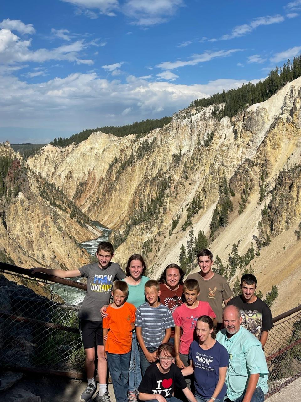 The Mast family of Crawford visits Yellowstone in July 2023. Rodney Mast and his wife, Christine, went from five children to eight after adopting three Ukraine orphans in 2019. He later joined the board of International Host Connection, helping orphans find families. Now he is working to help Ukraine refugees find hosts in the United States.