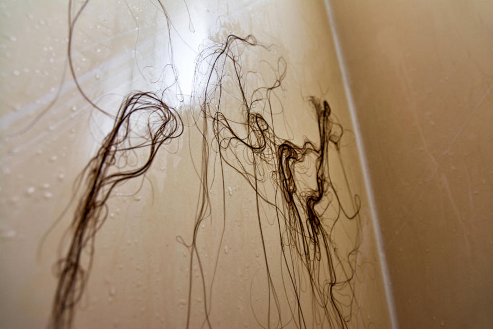 long hair on a shower wall