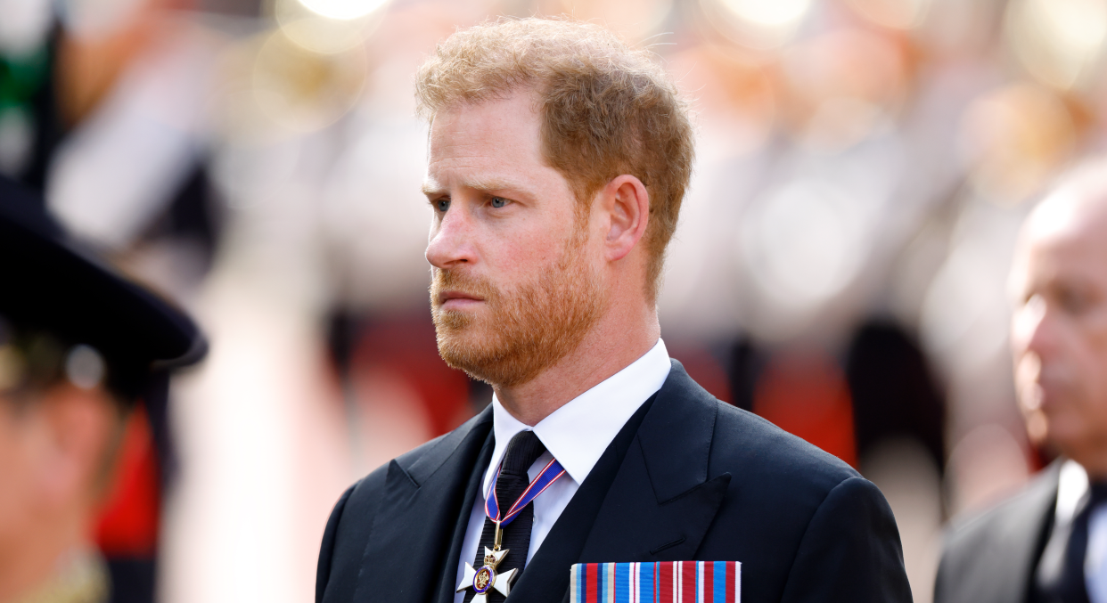 Prince Harry, Duke of Sussex walks behind Queen Elizabeth II's coffin as it is transported on a gun carriage from Buckingham Palace to The Palace of Westminster ahead of her Lying-in-State on September 14, 2022 in London, United Kingdom