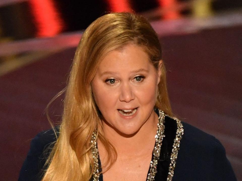 Amy Schumer joke about Leonardo DiCaprio draws gasp at Oscars (AFP via Getty Images)