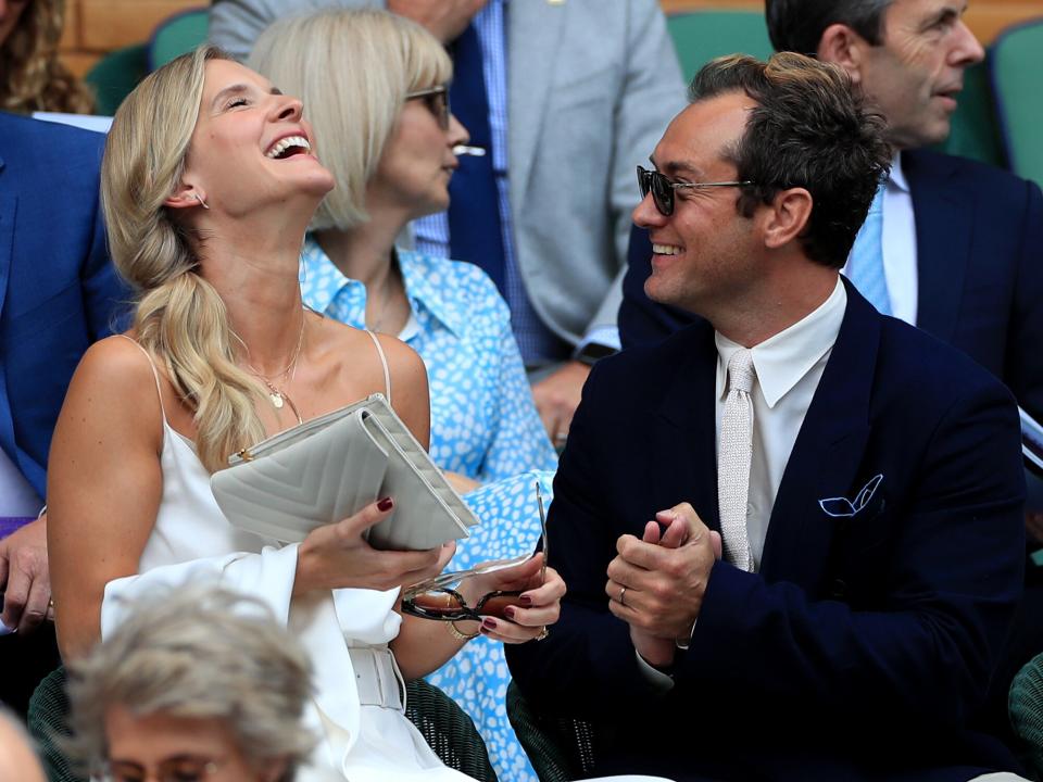 Jude Law with and his wife Phillipa on day eleven of the Wimbledon Championships at the All England Lawn Tennis and Croquet Club, Wimbledon