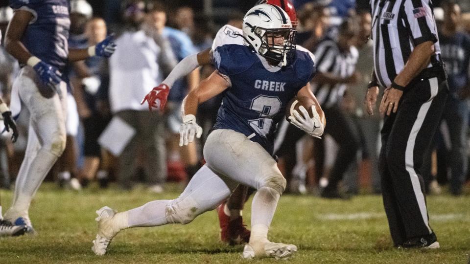 Timber Creek's Chase Conway runs the ball during the football game between Timber Creek and Willingboro played at Timber Creek High School on Friday, September 8, 2023.  