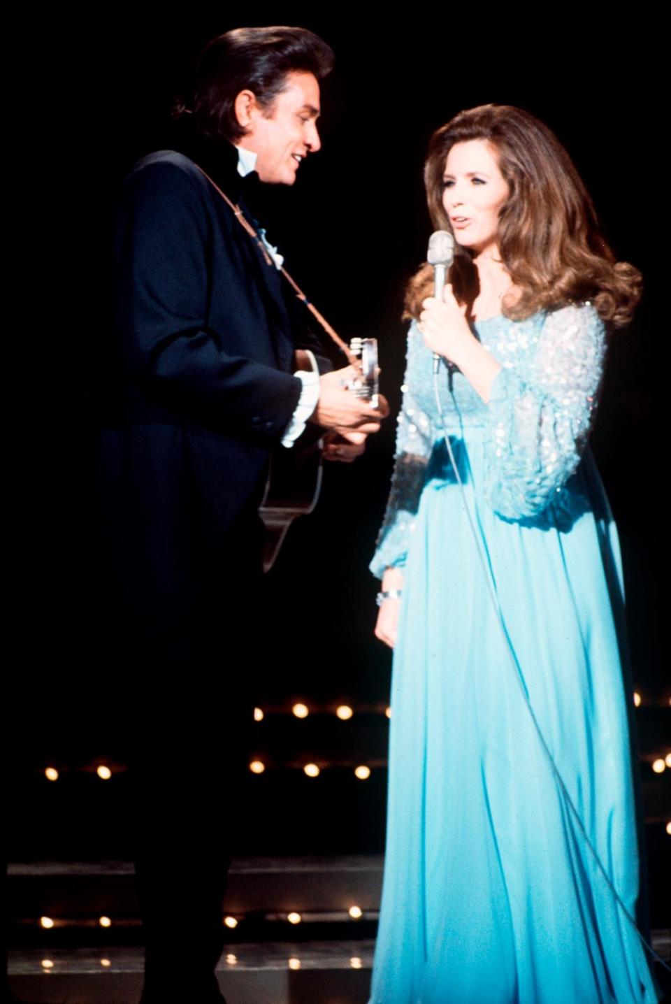 PHOTO: Johnny Cash and June Carter Cash sing at the Grand Ole Opry, in Nashville, Tenn., on April 10, 1970. (ABC Photo Archives via Getty Images, FILE)