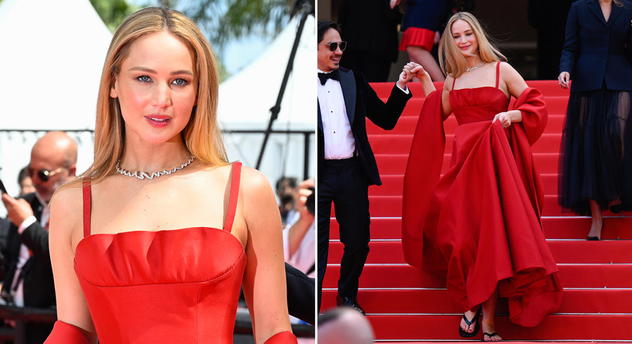 Jennifer Lawrence wears red dress and flip flops on the Cannes red carpet. (Getty Images)