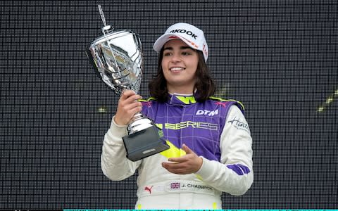 Jamie Chadwick of Great Britain celebrates after winning the first race of the W Series at Hockenheimring on May 04, 2019 in Hockenheim, Germany. W Series aims to give female drivers an opportunity in motorsport that hasnt been available to them before. The first race of the series, which encompasses six rounds on the DTM support program, is at the Hockenheimring on May 3rd and 4th - Credit: Matthias Hangst/Getty Images