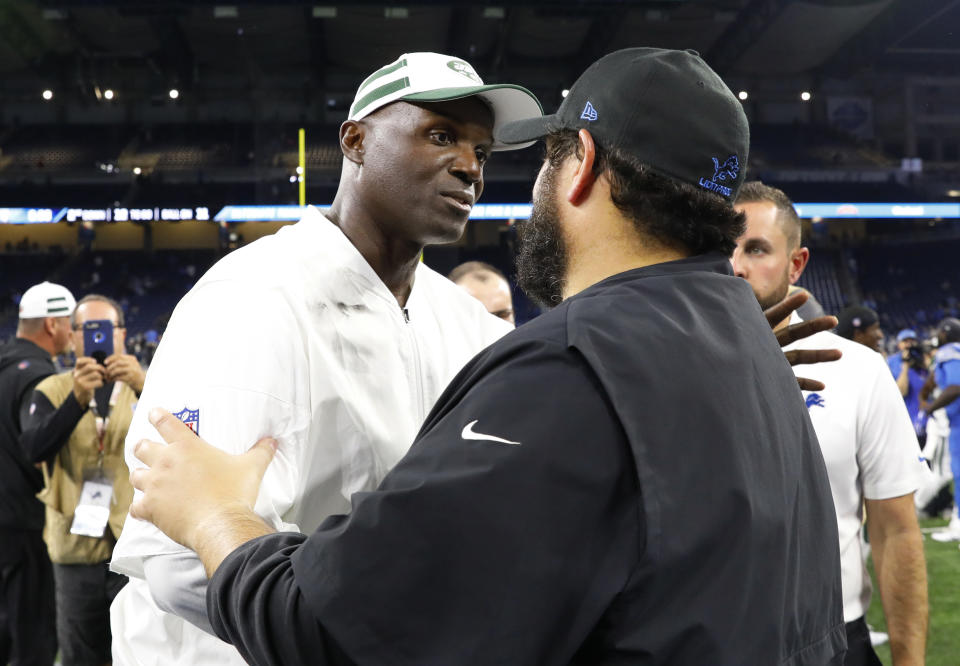 New York Jets head coach Todd Bowles, left, and Detroit Lions head coach Matt Patricia talk after an NFL football game in Detroit, Monday, Sept. 10, 2018. The Jets won 48-17. (AP Photo/Rick Osentoski)