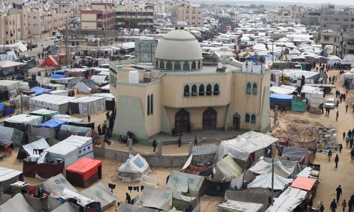 <span>A tent camp housing Palestinians displaced by the Israeli offensive in Rafah, Gaza, on Tuesday, 27 February 2024.</span><span>Photograph: Hatem Ali/AP</span>