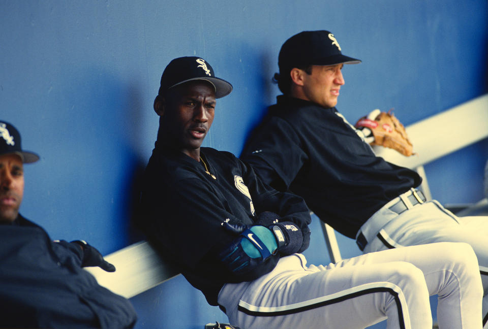Michael Jordan looks on from the bench during a Birmingham Barons game. (Photo by Focus on Sport/Getty Images)