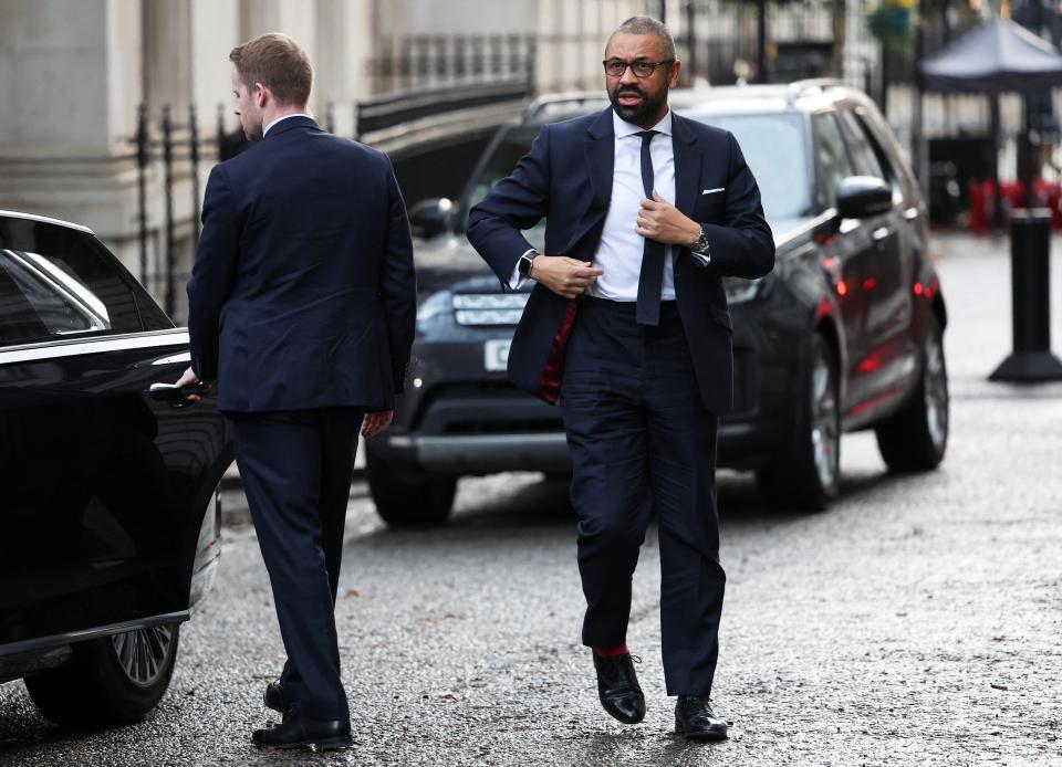 Home Secretary James Cleverly walks at Downing Street this morning (REUTERS)