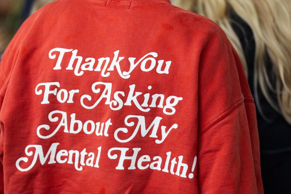 The back of a sweatshirt reading “Thank you for asking about my mental health!” at the groundbreaking ceremony for the Utah Mental Health Translational Research Building outside the Huntsman Mental Health Institute  in Salt Lake City on Monday.