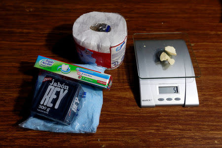 Cleaning products lie next to coca paste worth $18,000 Colombian pesos at a local store in Guyabero Region, Guaviare, Colombia, May 24, 2016. REUTERS/John Vizcaino