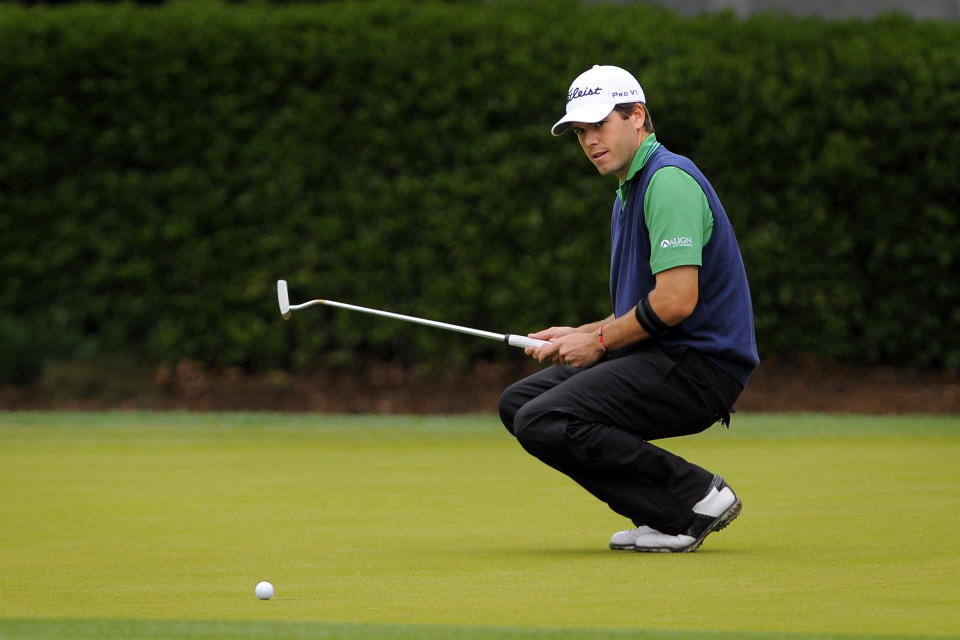 Ben Martin reacts after missing a birdie putt on the eighth green during the second round of the RBC Heritage golf tournament in Hilton Head Island, S.C., Saturday, April 19, 2014. Play was suspended during the second round Friday due to weather and resumed today. (AP Photo/Stephen B. Morton)