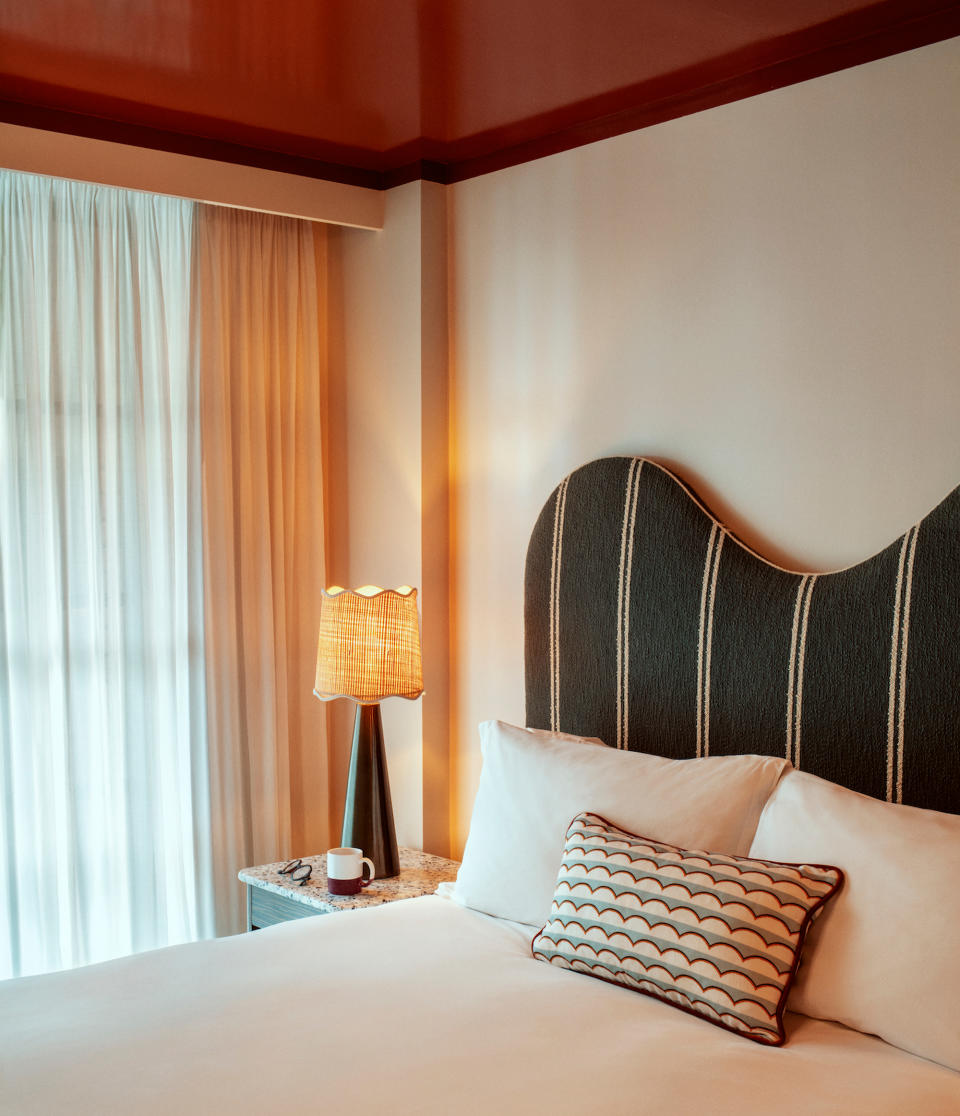 a hotel room with a gloss paint ceiling