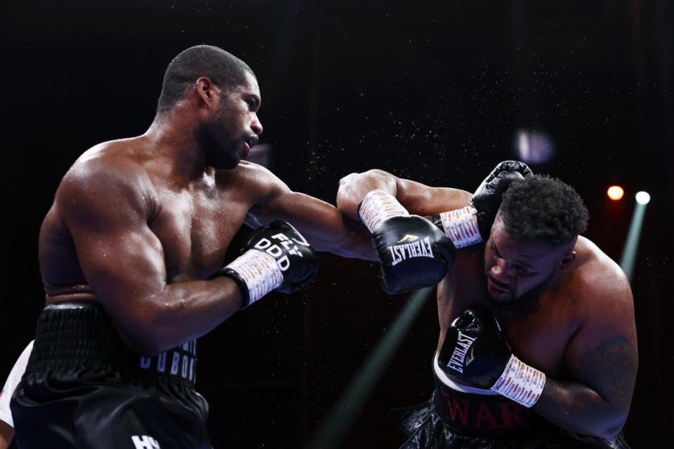 Daniel Dubois (left) battered Jarrell Miller at the end of their brawl in December (Getty Images)