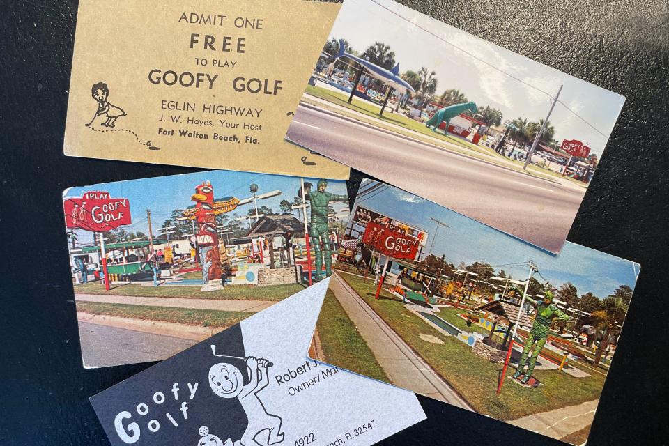 A collection of free golf passes show the history of Goofy Golf in Fort Walton Beach. The course opened in 1958 and has been a popular destination for locals and tourists alike ever since.