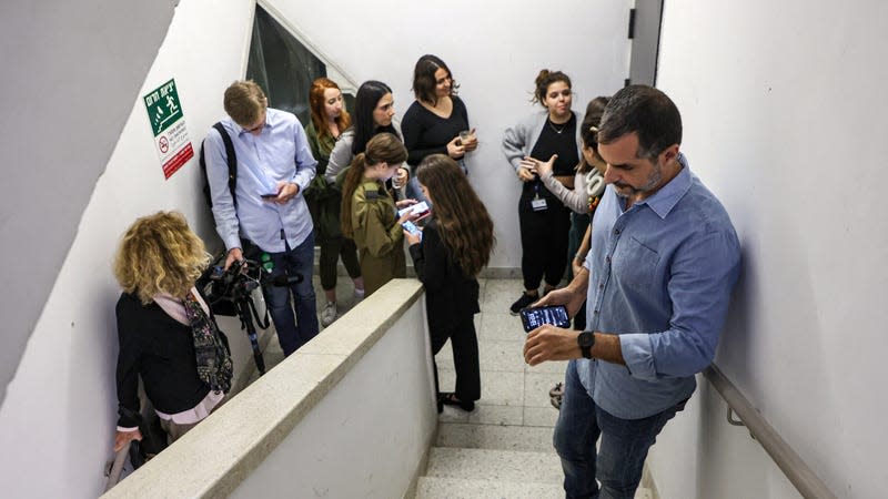 People take cover in a shelter during a rocket attack from Gaza, at the Ichilov Hospital in Tel Aviv on December 11, 2023 - Photo: Gil Cohen-Magen / AFP (Getty Images)