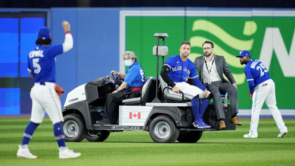 Toronto Blue Jays outfielder George Springer suffered a concussion and a sprained shoulder after a collision with teammate Bo Bichette in Toronto's dramatic wild card series loss to the Seattle Mariners on Saturday. (Getty Images)
