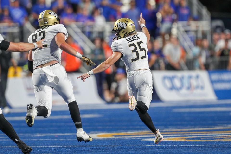 UCF place kicker Colton Boomer (35) celebrates after kicking a 32-yard field goal as time expired to beat Boise State, Saturday, Sept. 9, 2023.