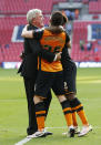 Britain Soccer Football - Hull City v Sheffield Wednesday - Sky Bet Football League Championship Play-Off Final - Wembley Stadium - 28/5/16 Hull City manager Steve Bruce and Andrew Robertson celebrate winning promotion back to the Premier League Action Images via Reuters / Andrew Couldridge Livepic EDITORIAL USE ONLY. No use with unauthorized audio, video, data, fixture lists, club/league logos or "live" services. Online in-match use limited to 45 images, no video emulation. No use in betting, games or single club/league/player publications. Please contact your account representative for further details.